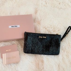 Miu Miu black color wristlet